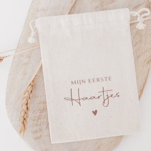 Bewaarzakje - Eerste Haartjes